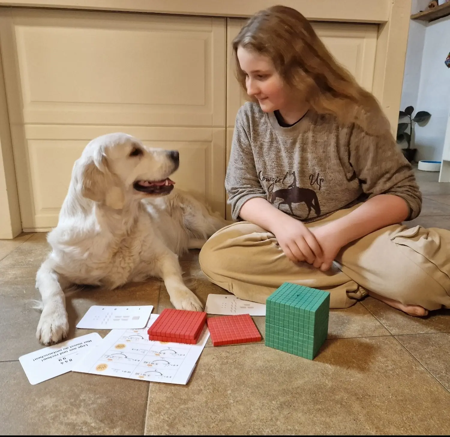 Mädchen und Hund von Praxis für Logopädie Marina Unger